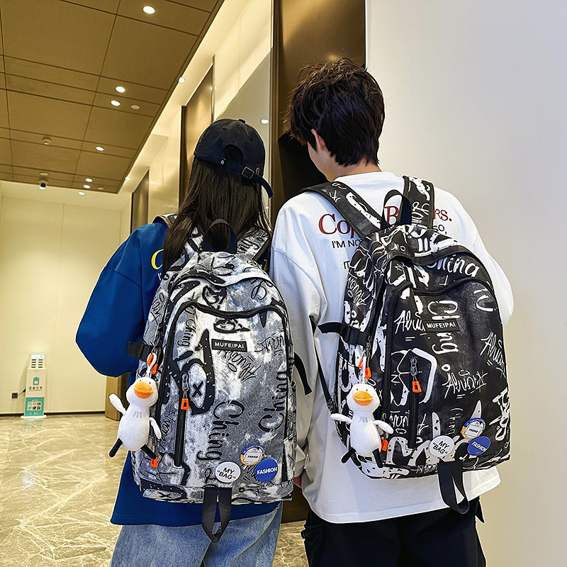 Personalized graffiti InS-style large-capacity schoolbags for grades 3-6, cool and casual brand backpacks, cross-border trend backpacks full figure