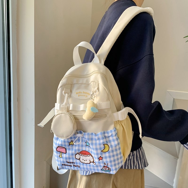 New spring lazy and personalized backpack for girls and students, large capacity for outings, cute schoolbag, cartoon print backpack details Picture