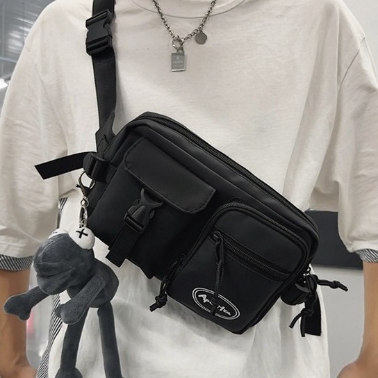 The new workwear-style mobile phone bag, a trendy crossbody bag for both men and women, is unique and cool. It is a versatile single-shoulder bag for outdoor sports details Picture