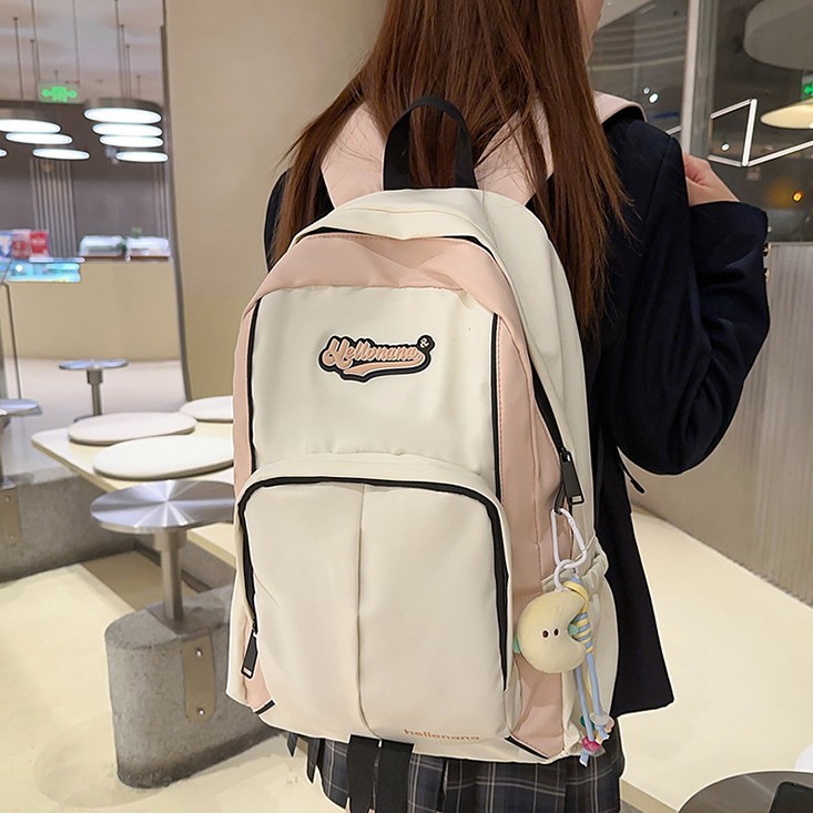The 2025 new model of junior and senior high school students features a niche design with a high level of appearance. It is simple and versatile, with a contrasting color American retro backpack details Picture