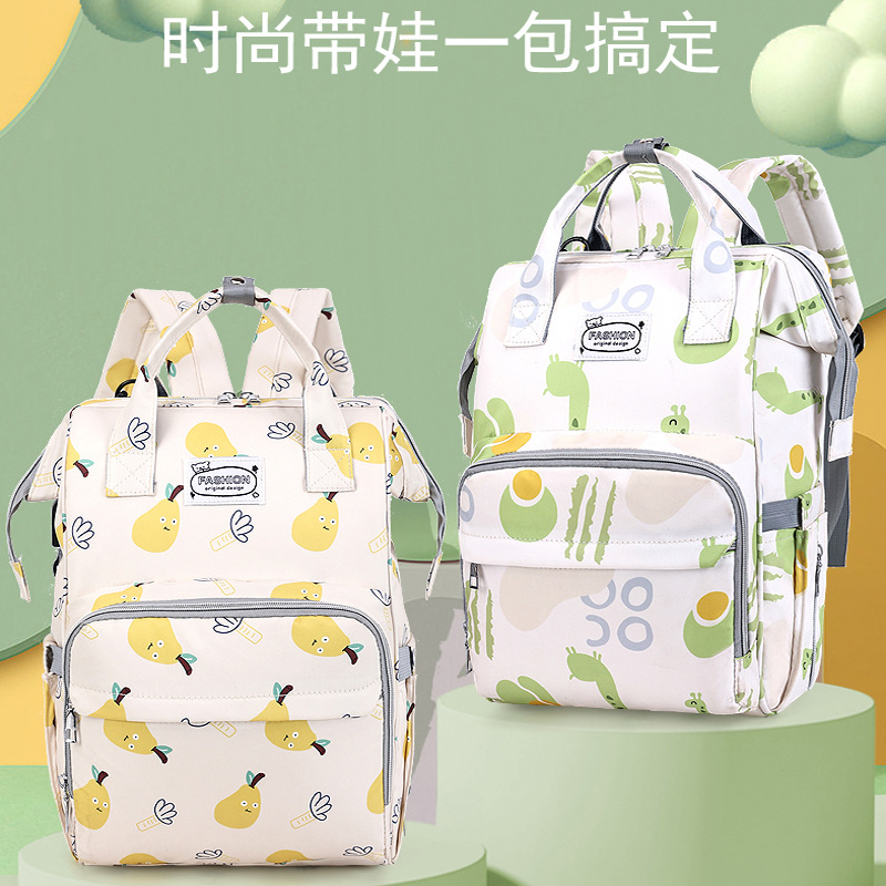 The new mommy bag for foreign trade, a fresh hand-held backpack, has a large capacity and is lightweight for going out. It can be used to hang baby strollers full figure