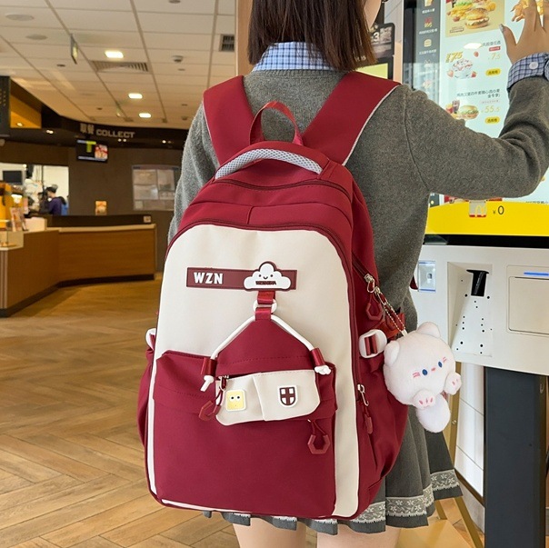A new high-appearance-level, lightweight, large-capacity and cute schoolbag for primary school students in grades three to six and junior and senior high school students full figure