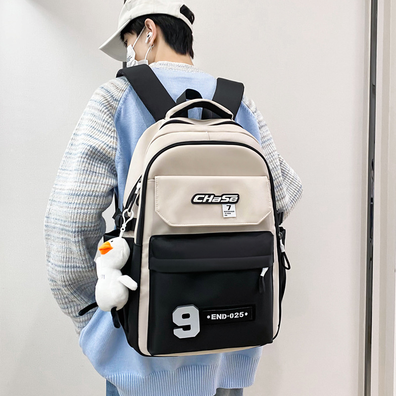 A large-capacity, trendy and casual backpack for college students, a Korean-style college student, and a versatile backpack for teenagers details Picture