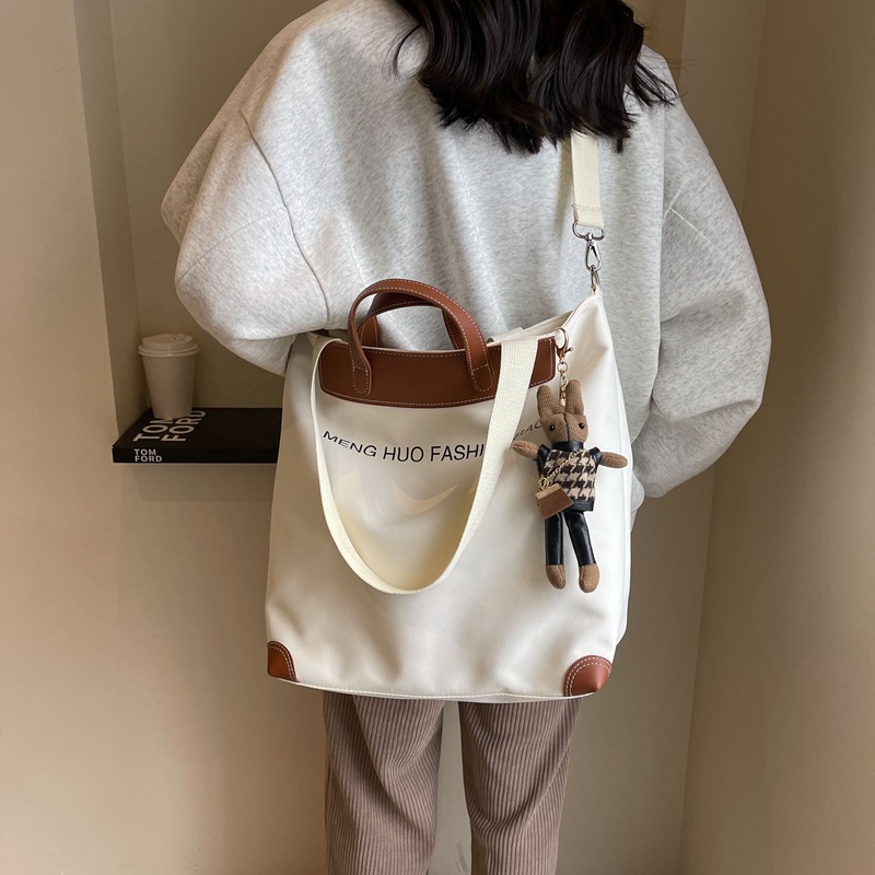 Fashionable large-capacity tote bag for women, new summer 2024 trendy ins single-shoulder bag, simple and casual commuting bag details Picture