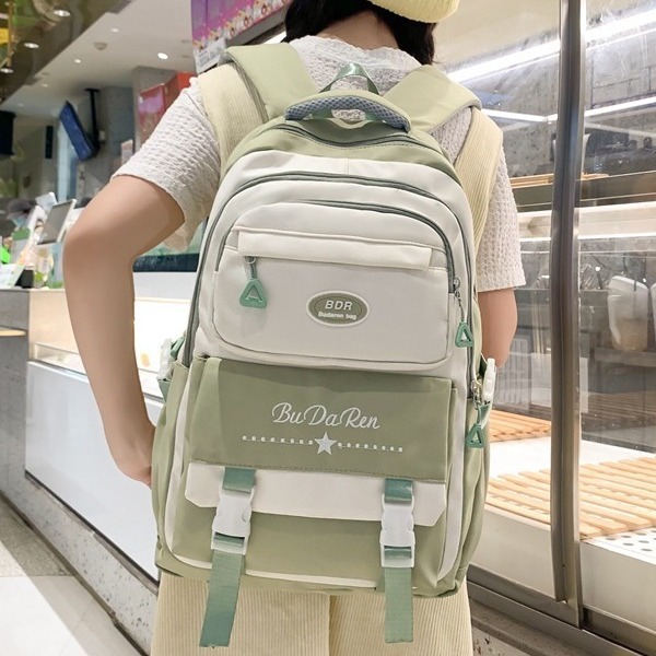 This is an Instagram-style high-appearance-level schoolbag for girls, a large-capacity high school backpack with multiple compartments, and a weight-reducing backpack for grades three to six full figure