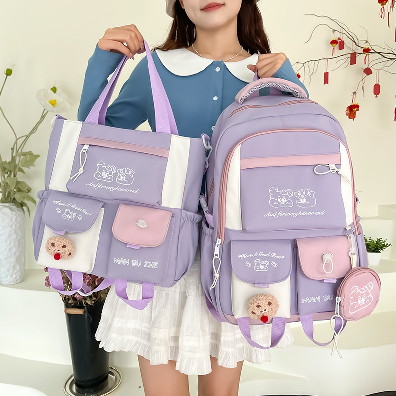 This Japanese-style ins schoolbag is versatile and cute in contrasting colors. It's a two-piece backpack set for primary and secondary school students in grades three to six details Picture