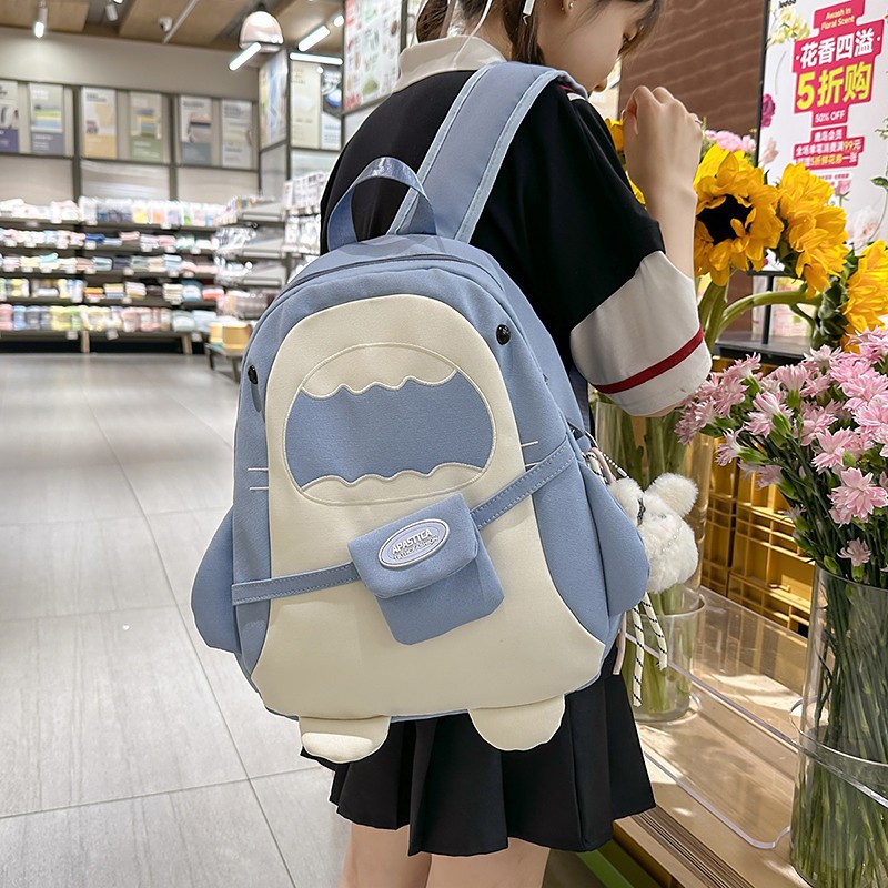 Cross-border Backpack 2025 New Style Cute Shark Schoolbag for primary and secondary school students, large capacity, high appearance level, fashionable and versatile bag Application Scenario