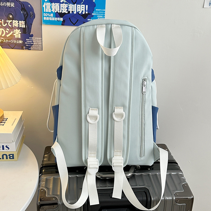 A cute color-blocking backpack for female college students in 2025, a large-capacity travel backpack for junior and senior high school students Specification drawing