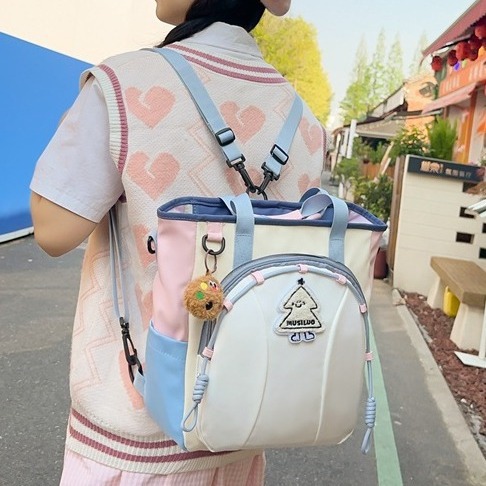 This Korean-style InS-style schoolgirl backpack is versatile and color-blocking. It's a hand-held shoulder bag for primary and secondary school students during class tutoring full figure