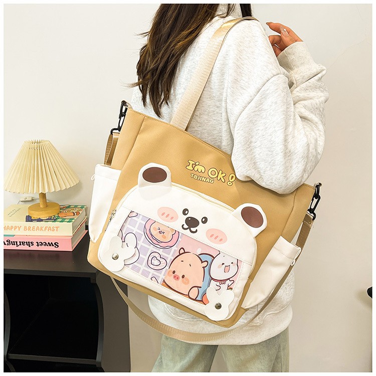 2025 New cute large-capacity commuter student tutorial bag, cartoon simple crossbody bag, high appearance level single-shoulder bag details Picture