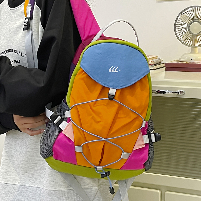The 2024 new Korean version of the classic color-blocking hiking picnic bag for casual outdoor use, a lightweight and large-capacity travel backpack for women details Picture