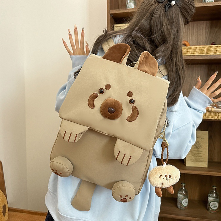 A cute and funny backpack for a junior high school girl. A cartoon Japanese-style cute little raccoon backpack. Large capacity and high appearance level backpack full figure