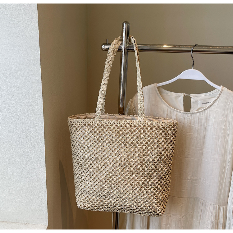 Letter-embroidered woven bag for women, Spring/Summer 2025 new vacation-style hollowed-out single-shoulder bag, fashionable and simple beach bag Application Scenario