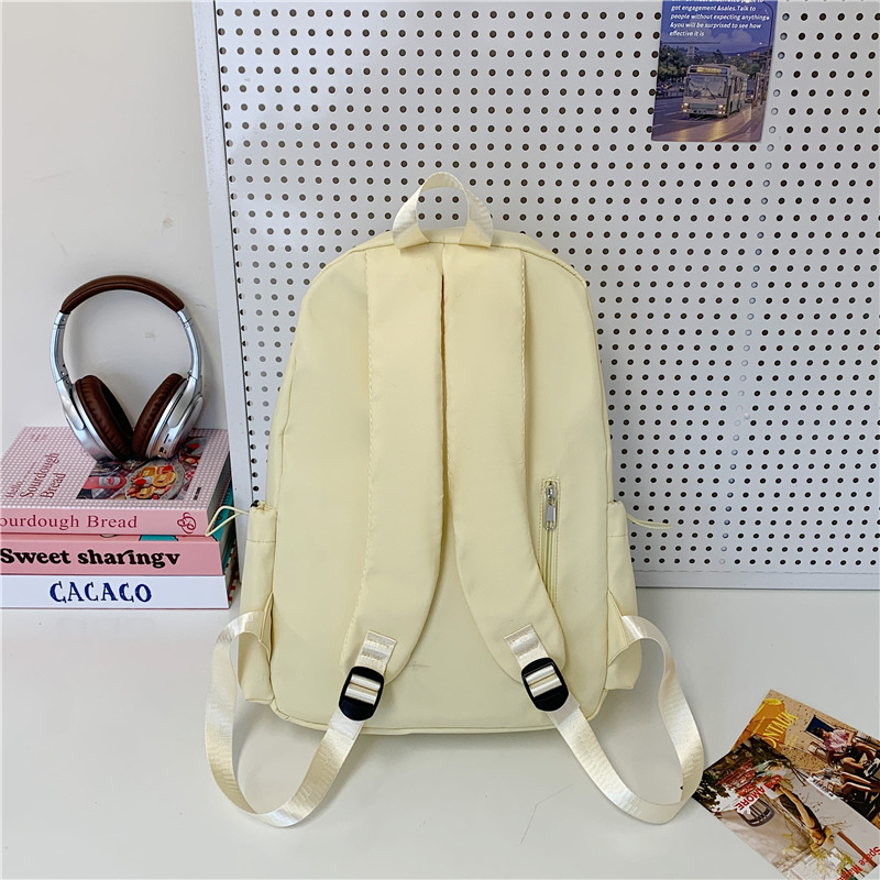 A new Japanese-style ins fresh and sweet candy-colored backpack for junior and senior high school students with a large capacity for light travel Specification drawing