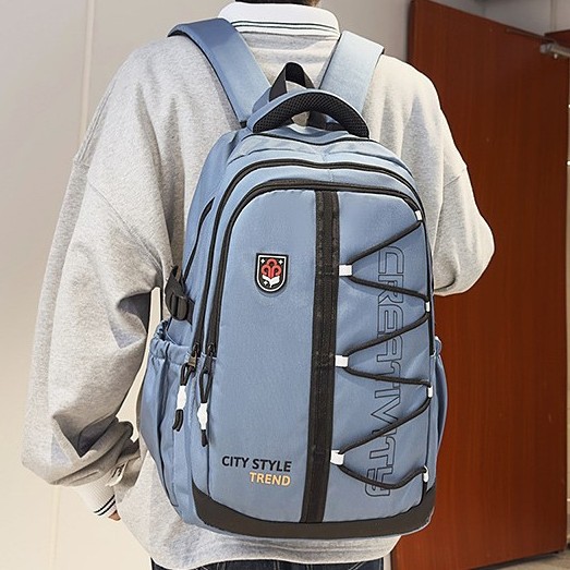 A new, stylish retro workwear backpack with a high aesthetic level. It's a casual, simple, lightweight and large-capacity backpack for junior and senior high school students details Picture
