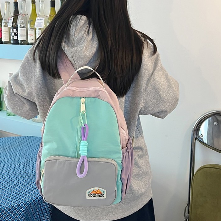 Japanese-style Instagram cute and lightweight children's travel backpack with high appearance level, ice cream color matching soft girl travel backpack details Picture