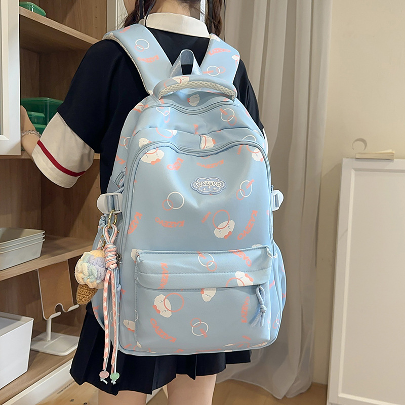 A new high-appearance-level Korean-style fresh and sweet letter backpack, a lightweight, simple and large-capacity backpack for junior and senior high school students full figure