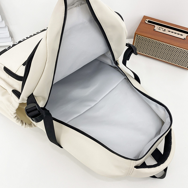"Schoolbag Man 2024 New style simple and casual middle school backpack Solid color versatile letter trendy travel backpack. Application Scenario