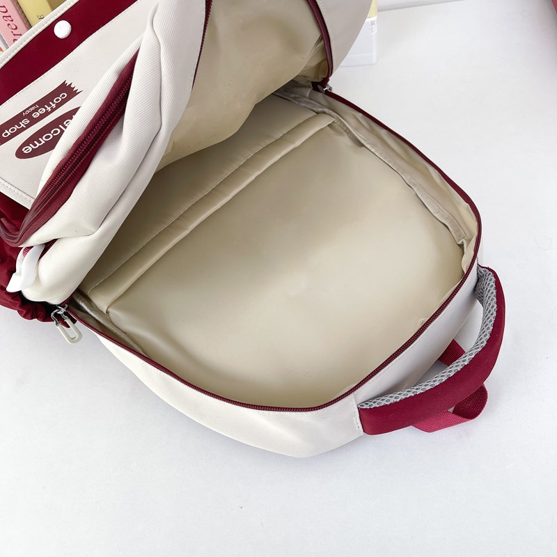 Korean style Instagram cute color-blocking backpacks for camping, lightweight and casual travel bags, versatile new student schoolbags for commuting Application Scenario