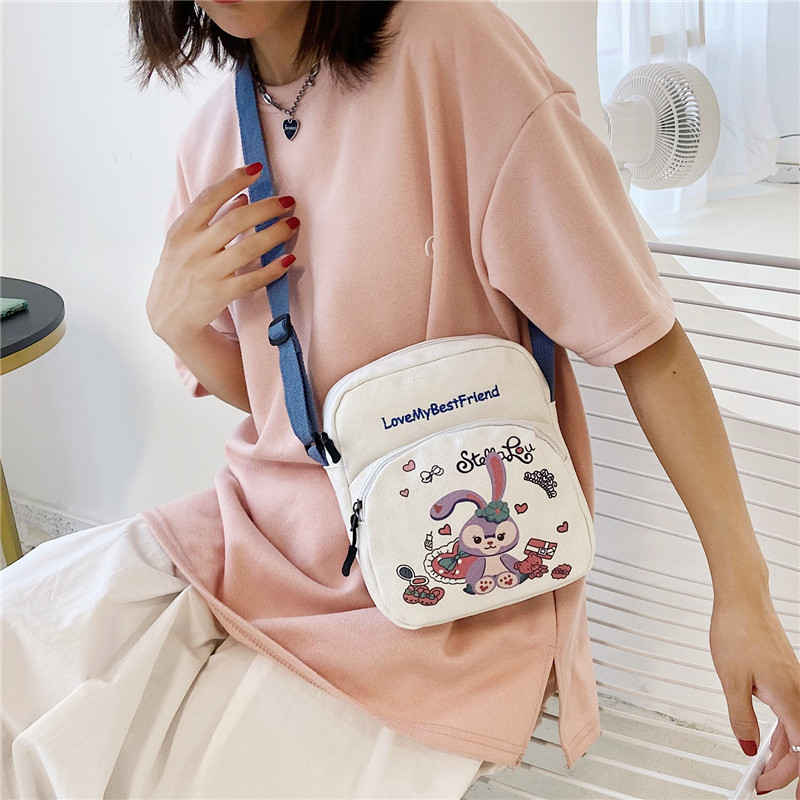 A cute canvas small square bag for girls, a new energetic girl student phone bag, a Japanese-style fresh and artistic single-shoulder crossbody bag Application Scenario