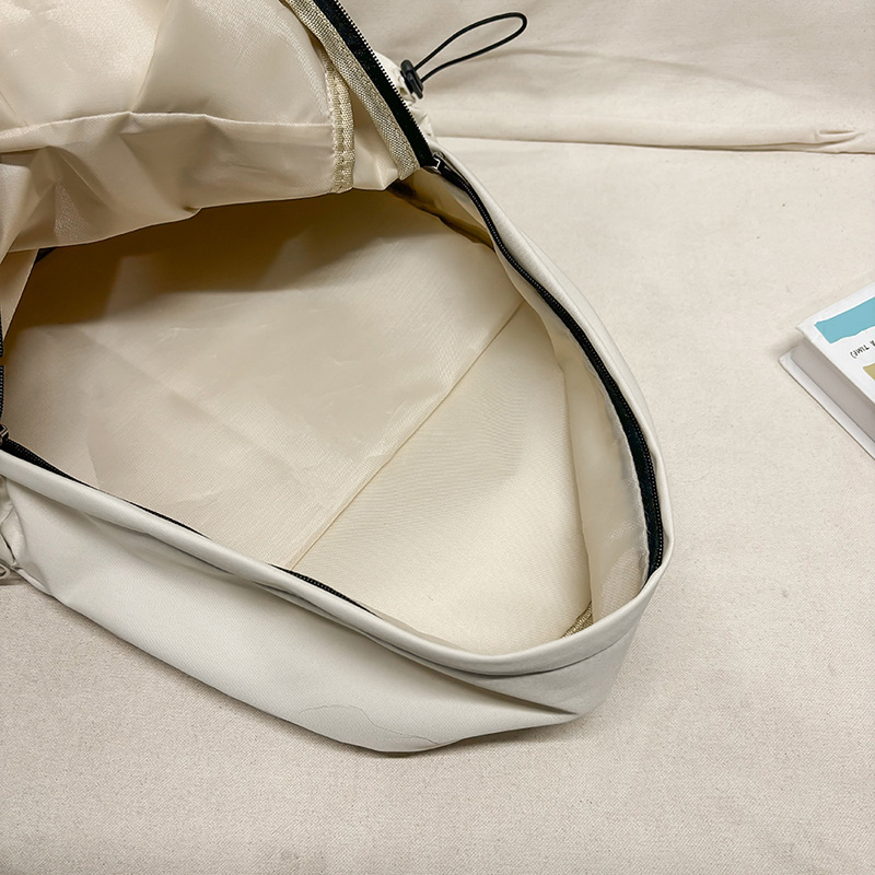 Versatile, simple and solid color college student schoolbag, Korean style Instagram large-capacity casual backpack, lightweight travel single-shoulder bag Application Scenario