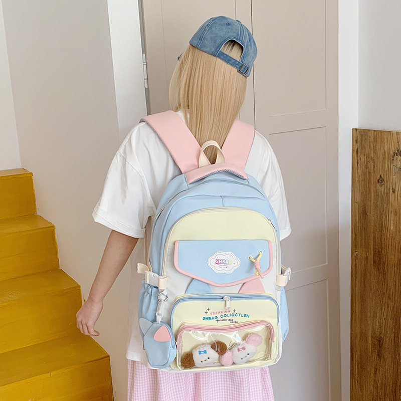 The 2025 new ins cute pain bag, with a school style, is versatile, has a high appearance level, a large capacity and multiple compartments, and is a sweet backpack full figure