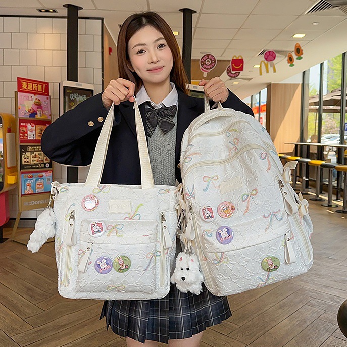 Schoolbag for female junior high school students, high appearance level, cute bow backpack, large-capacity backpack for primary school students from grades three to six full figure