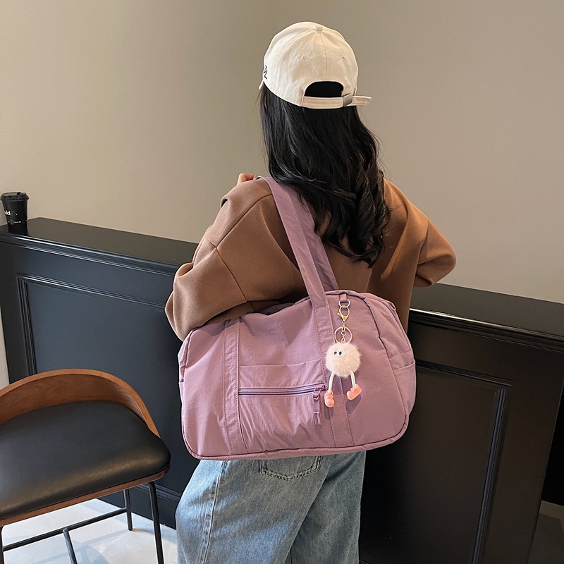 Niche lightweight travel bags, large-capacity casual Korean-style fitness bags, solid-color versatile backpacks, simple commuting tote bags details Picture