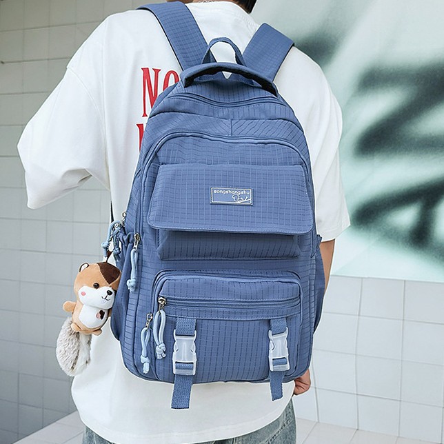 A new Korean-style ins solid-color backpack for couples, featuring a casual, simple, lightweight and versatile large-capacity backpack details Picture