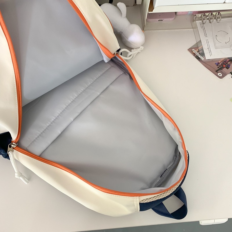 The 2025 new large-capacity, color-blocking, fashionable, multi-layered backpack for junior and senior high school students is versatile, simple and casual Application Scenario