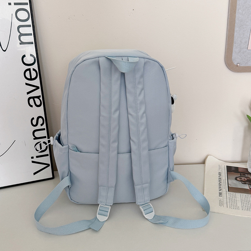 The new fresh and sweet checkered backpack is a casual, simple, lightweight and versatile large-capacity backpack for high school and junior high school students Specification drawing