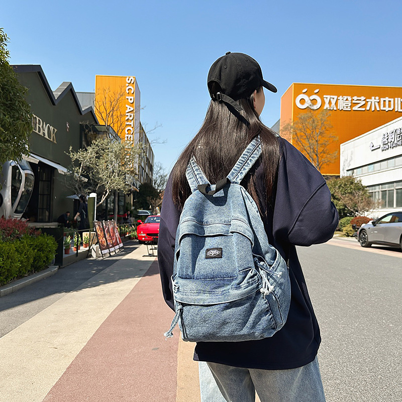 2025 New casual college style single-shoulder bag for couples, fashionable college student schoolbag, simple and lightweight denim backpack details Picture