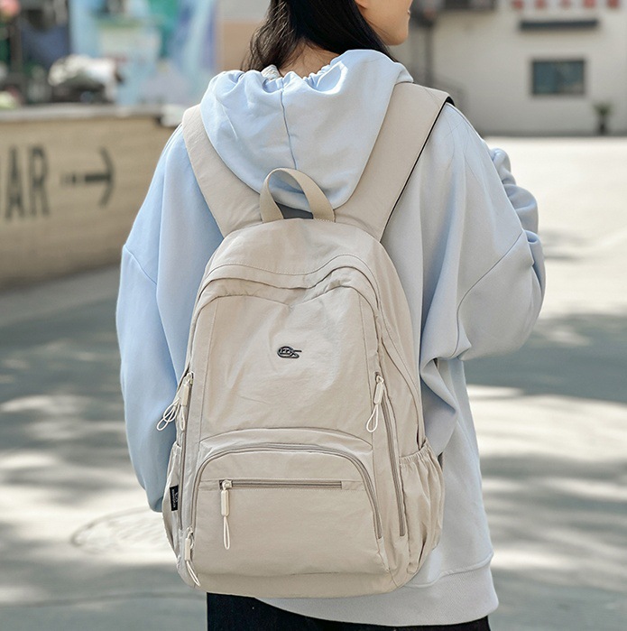 Korean-style Instagram minimalist school girl backpack, Japanese-style Harajuku style high appearance level solid color middle school student backpack full figure