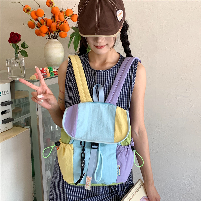 New fashionable color-blocking canvas bag for college students in class, new large-capacity schoolbag and backpack for women in 2025 Application Scenario