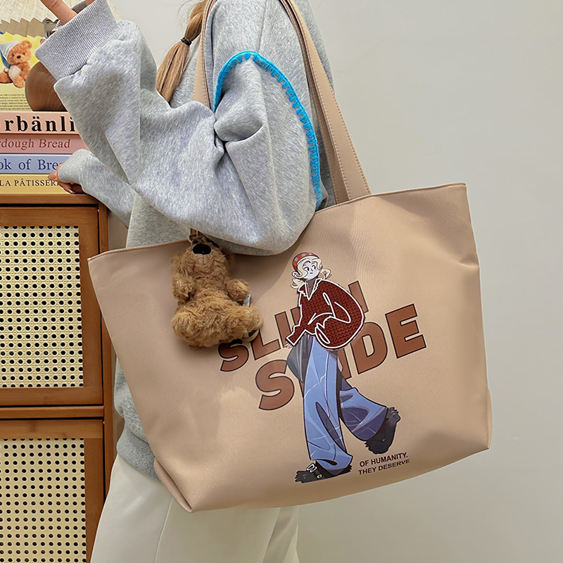 Creative and personalized single-shoulder bag, large-capacity hand-held shopping bag, new summer simple college student tote bag for class full figure