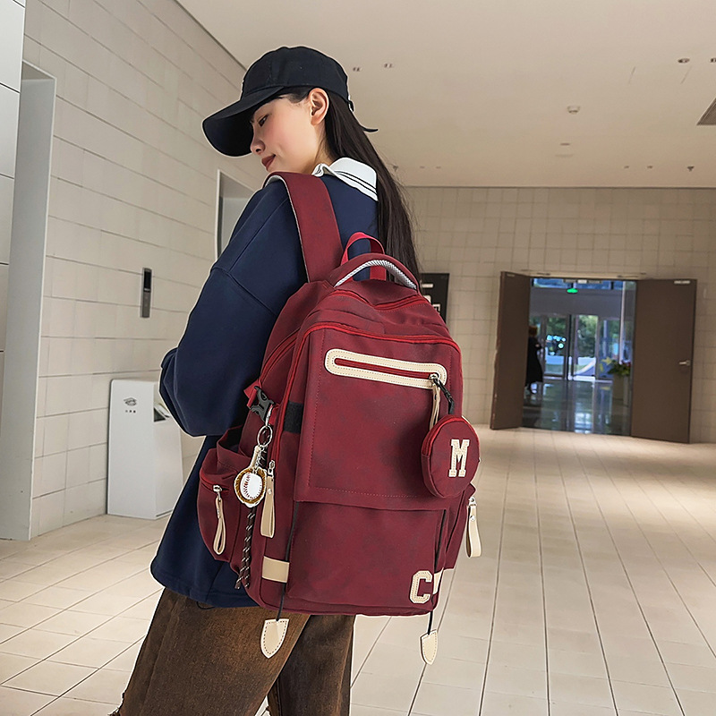 A lightweight backpack for boys, junior high school and senior high school students, 2025 new large-capacity, simple backpack for girls full figure