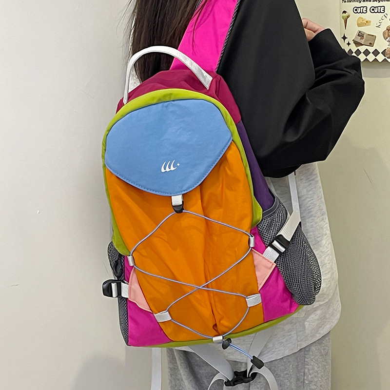 The 2024 new Korean version of the classic color-blocking hiking picnic bag for casual outdoor use, a lightweight and large-capacity travel backpack for women full figure