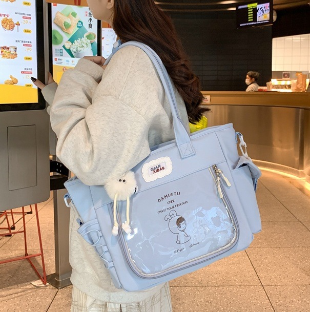 Cute transparent crossbody bag, female student hand-held pain bag, large-capacity cartoon single-shoulder tote bag, class tutorial bag full figure