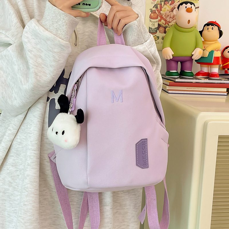 A simple and cute female college student's small backpack for shopping and attending classes. A cute mini backpack for children's spring outing details Picture