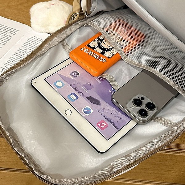 A new Japanese Instagram backpack with a high level of appearance, fresh and sweet, featuring color-blocking and splicing for women. It is lightweight and has a large capacity for spring outings Application Scenario