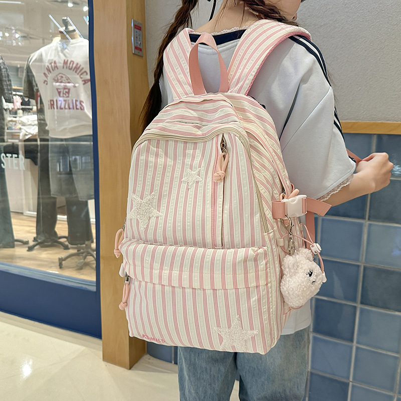 A new Japanese-style ins high-appearance-level, fresh and sweet candy-colored backpack, a lightweight and large-capacity backpack for junior and senior high school students full figure