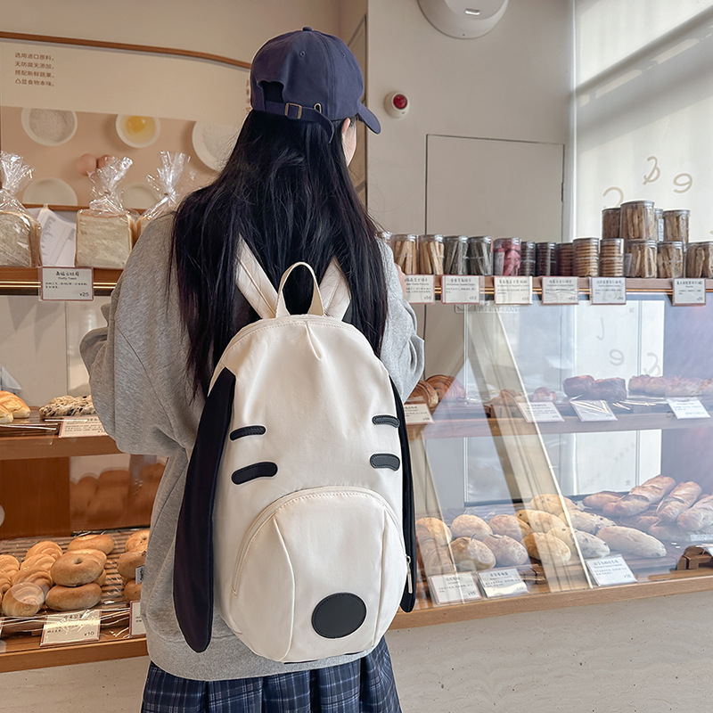 Cute puppy cartoon backpack, super cute and funny, large-capacity schoolbag, versatile travel bag, and niche backpack full figure