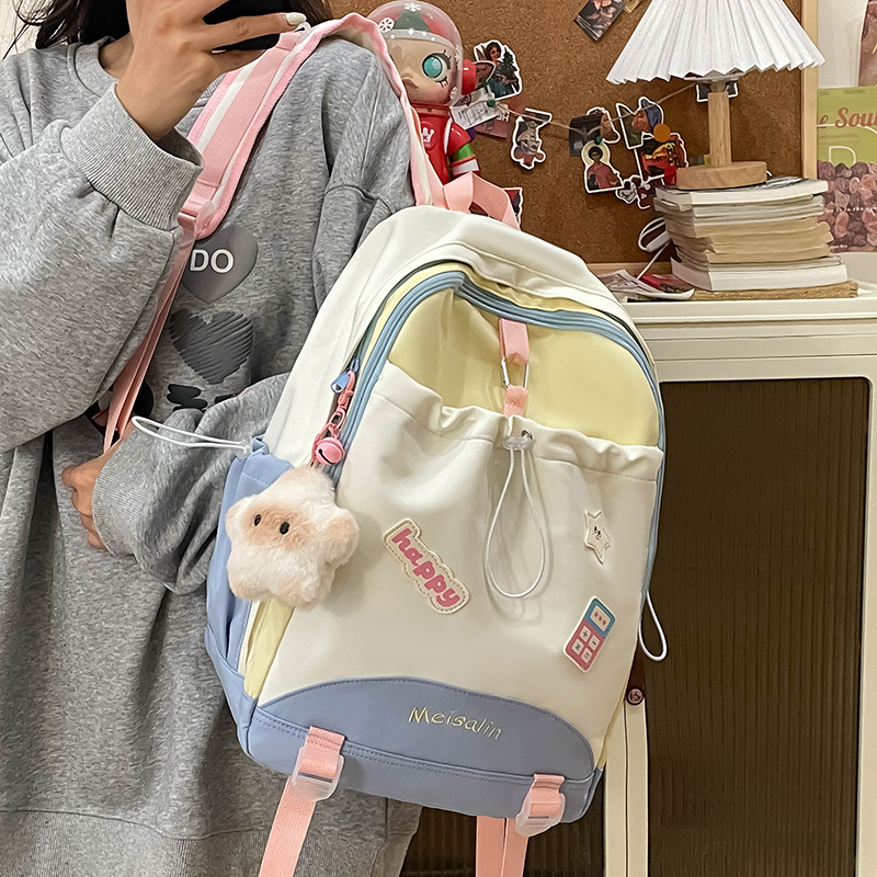 The new summer backpack for women is fresh and cute with a college style. It has a large capacity and is a schoolbag for junior high school, senior high school and college students full figure