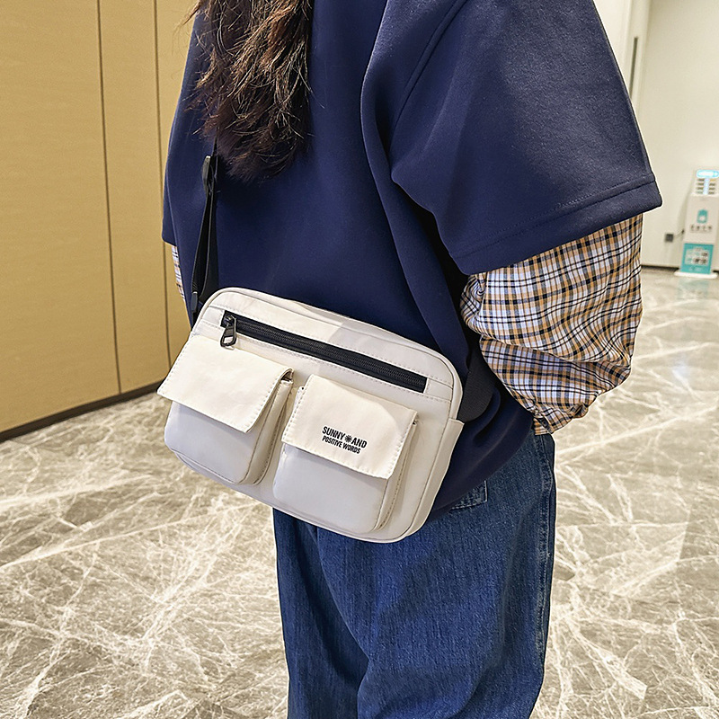 2025 New trendy brand single-shoulder bag for men, Japanese casual, simple and versatile crossbody bag, lightweight mobile phone, small backpack for women details Picture