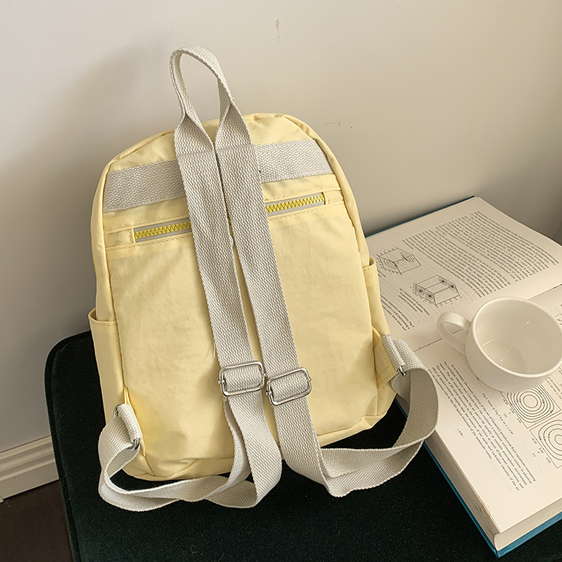 A casual and versatile mini backpack for foreign trade, a Japanese-style ins lightweight and high-appearance-level soft and creamy yellow travel backpack Specification drawing