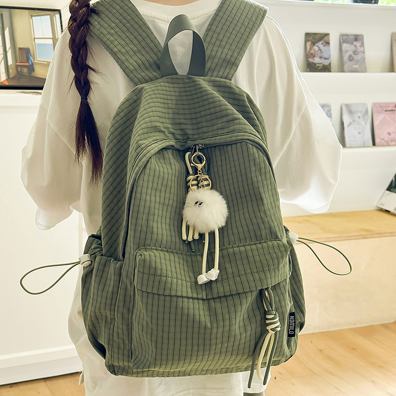 A new Korean-style ins backpack with a high level of appearance, fresh and sweet, student casual and simple striped large-capacity backpack full figure