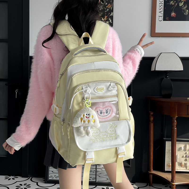 The new college-style transparent and fresh color-blocking schoolbag is a multi-layered lightweight backpack for primary and secondary school students in grades 3 to 5 details Picture