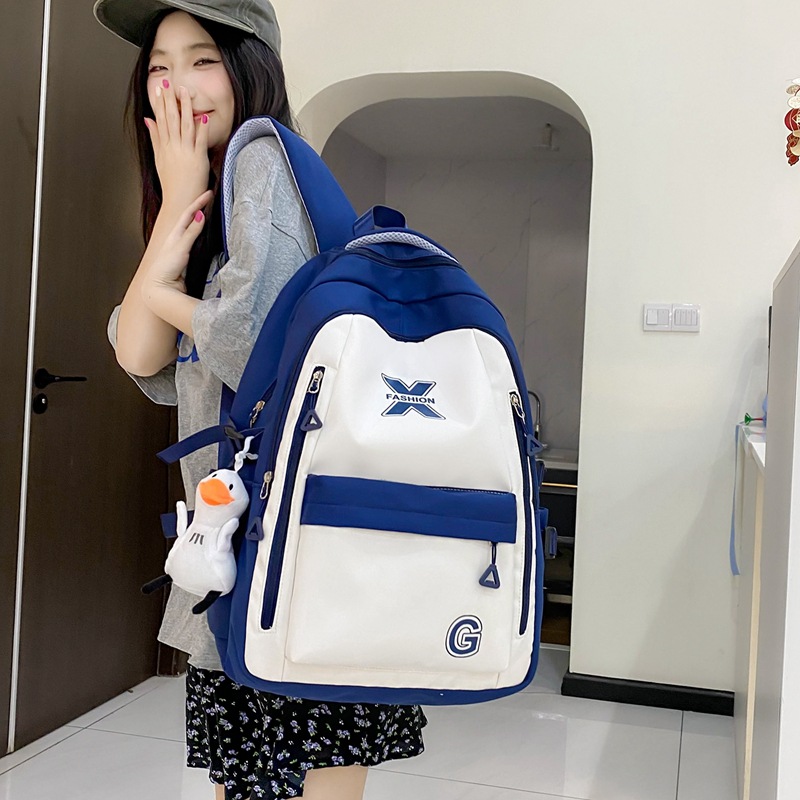 Wholesale of new large-capacity junior high school and senior high school schoolbags, female college student computer backpacks, simple and dirt-resistant casual backpacks full figure