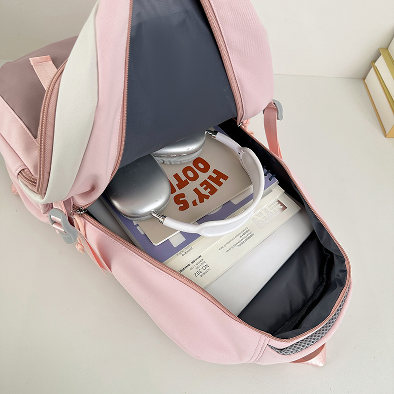 A new high-appeal, niche, color-blocking backpack from the Korean version of Instagram, a couple's casual, simple and large-capacity backpack Application Scenario
