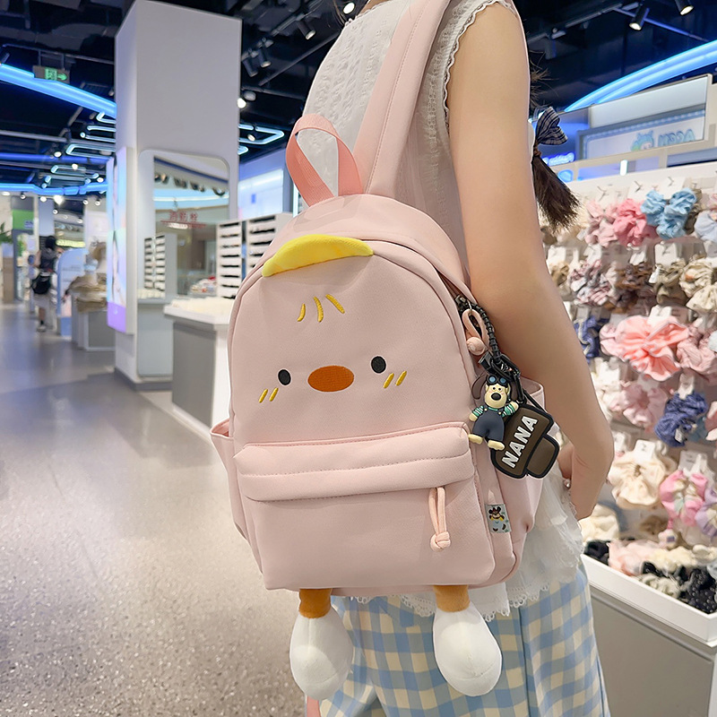 A new high-quality, sweet and cute ins cartoon chick schoolbag, a versatile backpack for primary and secondary school students' casual commuting full figure